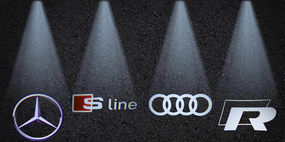 Accesorii auto moderne: De ce să alegi proiectoarele de logo pentru mașina ta?