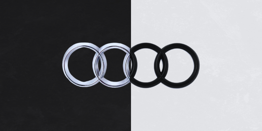 Emblema mașinii tale: Eleganța cromului sau stilul modern al negrului lucios?